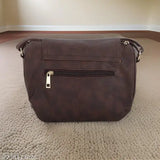 Brown faux leather sling bag, with zip closure