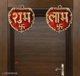 Engraved metal door hanging with swastik decoration in gold and red, showcasing Chandra Art Collection
