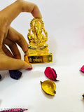 Gold metal Ganesh Idol, intricately detailed Lord Ganesha figurine for home decoration (5cm L x 7cm H x 1cm B)