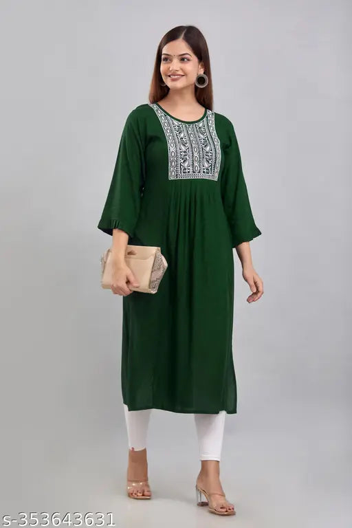 Dark green embroidered rayon kurti with three-quarter sleeves, ideal for festivals and events. Perfect for women's casual or office wear