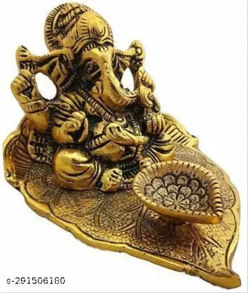 Metal Ganesh on Pipal Leaf Diya Set, Vastu home decor for luck, love, happiness, and prosperity. Size: 9.5x10.5x6 cm