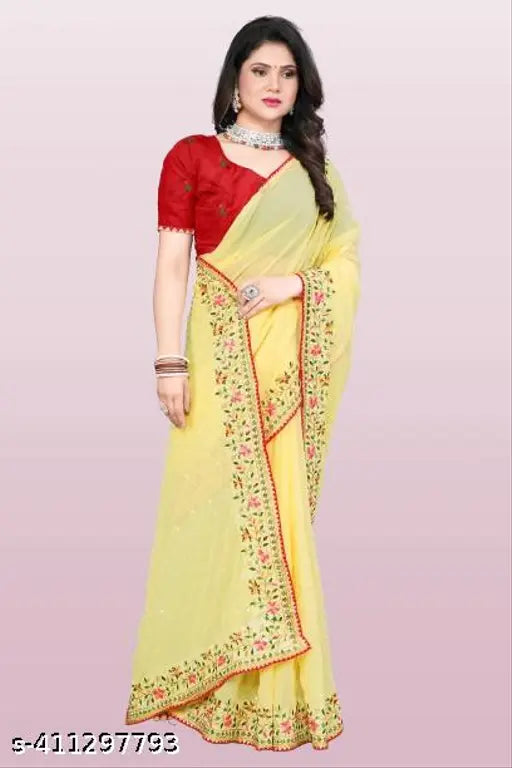 Trendy yellow sari with red blouse, silver embroidery, lace border