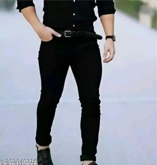 Black polycotton stretchable men's slim mid-rise jeans. Comfortable, well-tailored design for casual, party, and office wear. Breathable fabric and anti-corrosive button. Best quality zip for hassle-free use. Sizes 28, 30, and 32 available. Made in India