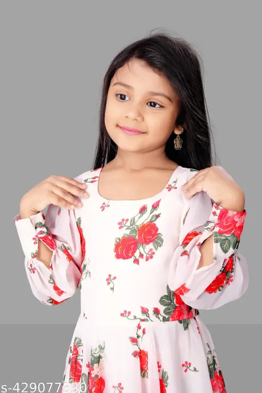 A vibrant red floral dress with puffy sleeves for a young girl