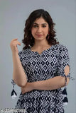 Printed cotton Anarkali kurti for women, three-quarter sleeves and mid-calf length. Modern, flared, and ikat-inspired design. Perfect for functions, festivals, parties, or weddings