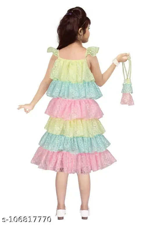 Colorful rainbow ruffle girls' dress. Includes a matching bag