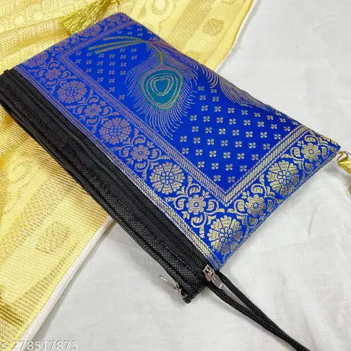 Fashionable women's clutch purse with intricate blue paisley design
