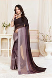 Dark blue and silver shimmer sari with border, woman in background