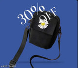 Black cotton zip pouch, with a floral embroidered patch on the front