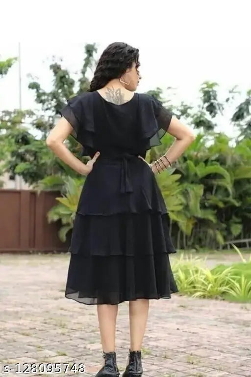 Women's black sleeveless georgette dress with V-neck and ruffle trim