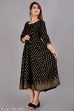 Stylish rayon gold-printed kurti, three-quarter sleeves, rayon fabric, Indian-origin long Anarkali design with gold tashal's on backside
