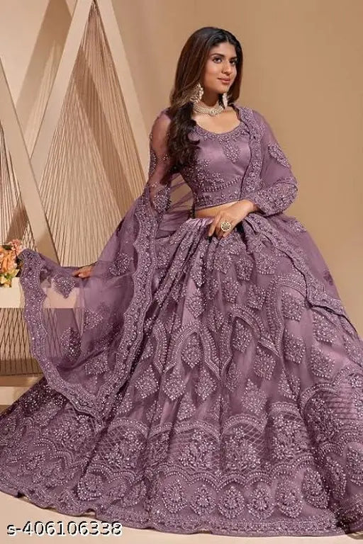 Embroidered net lehenga-choli with dupatta, Indian designer wedding wear featuring zari thread embellishments and satin silk inner lining