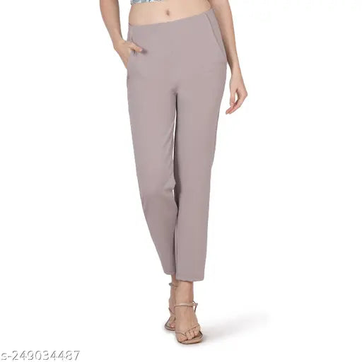 Gray stretchy fabric, women's or girls' casual trousers with elastic pockets, waistband, and cropped length