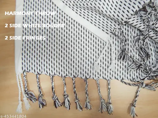 Brown and white hand-woven cotton sofa throw with chunky stripes and fringes, perfect for living room, bedroom, or office decor