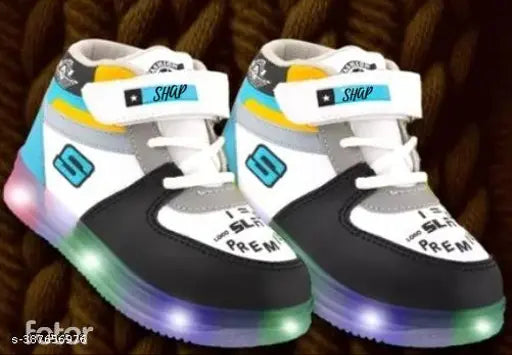 Trendy blue and white kids casual sneakers, lit up with glow in dark accents