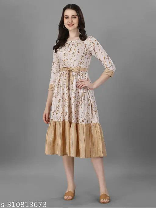 Women's floral printed fit-flared cotton kurti with three-quarter sleeves, featuring embroidery work. Ideal for office, parties, outings, and weekend gatherings. Available in various sizes: M (38in bust, 42in length), L (40in bust, 42in length), XL (42in bust, 42in length), XXL (44in bust, 42in length), XXXL (46in bust, 42in length). Indian cotton kurti for women