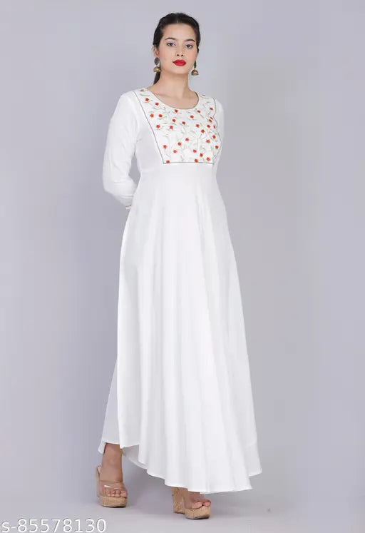 Embroidered white rayon slub kurti with three-quarter sleeves, country of origin India