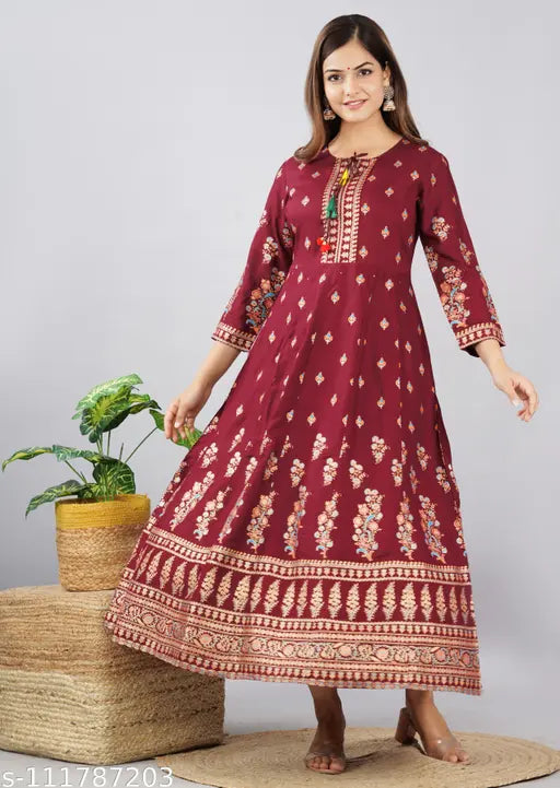 Maroon long kurta, flared hemline, embroidered details
