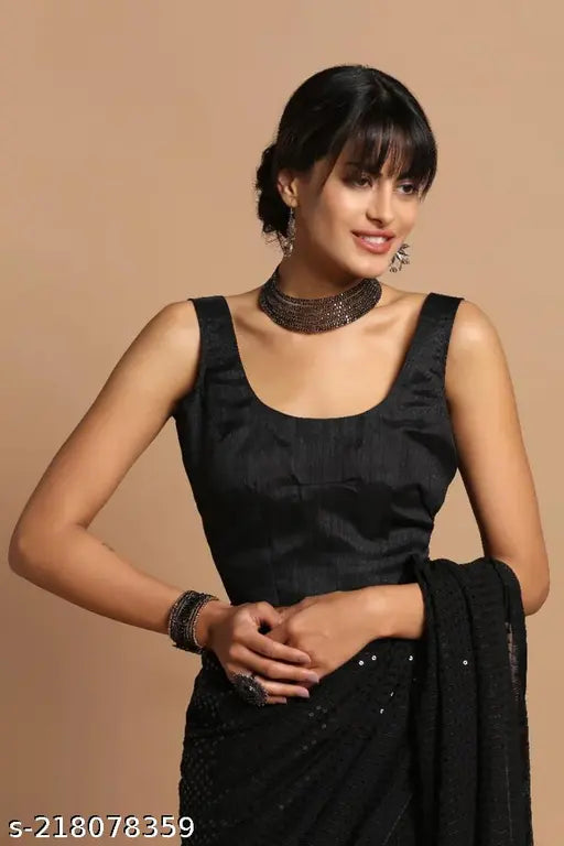 Black sari with sequin embellishments, pleated style