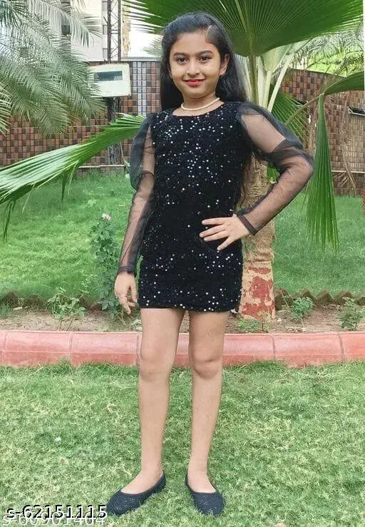 Girl in black dress with lace sleeves