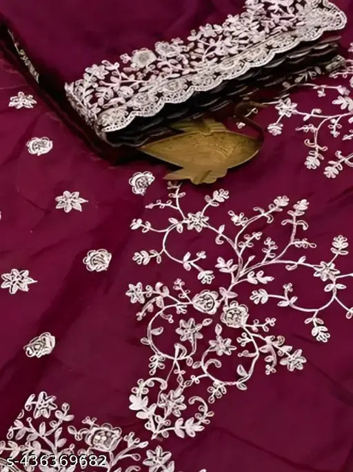 Red lace saree with intricate designs