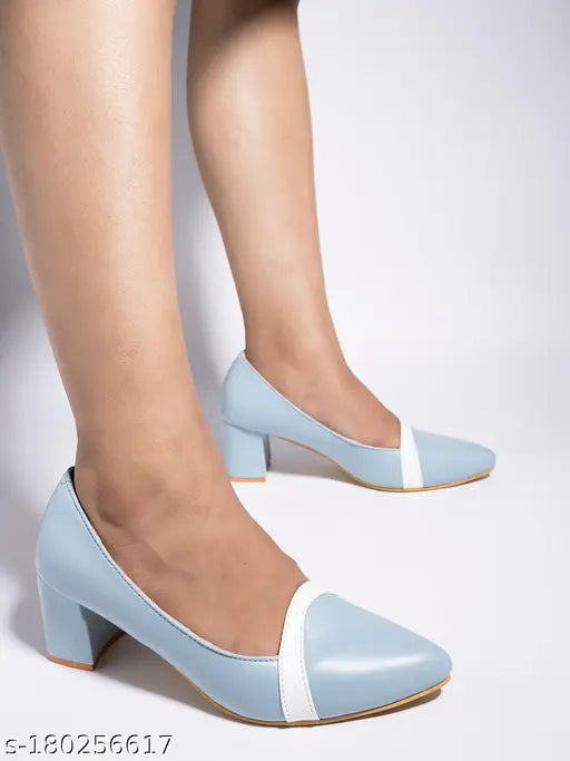 Synthetic blue heeled pumps with pointed toe detailing and slip-on fastening - casual party wear for women from Sheotopia