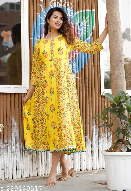 Yellow Rayon Anarkali for women with three-quarter sleeves, vibrant Indian print