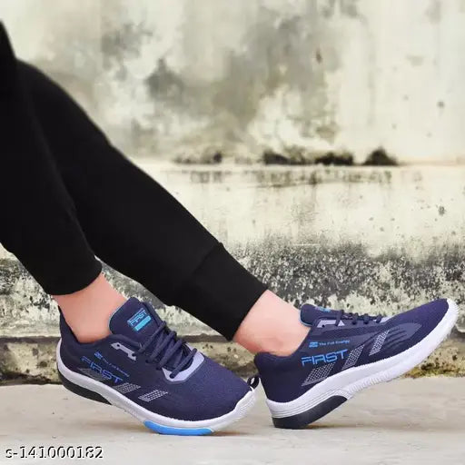 Navy blue sports shoes for boys with white soles, suitable for casual wear and daily use