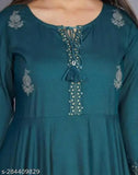 Teal blue embroidered long-sleeve blouse with a V-neck