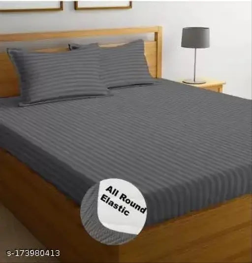 Navya Home Decor striped yellow 100% cotton elasticated fitted bedsheet with 2 pillow covers (78x72+10 inches), ideal for adult mild winter use