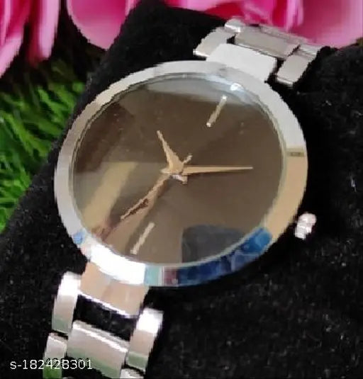 Silver tone analog watch with minimalist design for women, 30mm face diameter, sleek leather strap