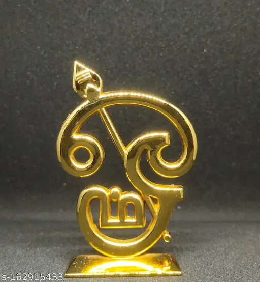 Golden steel Om sculpture from Rishi Crafts' Dashbord collection. Detailed design, perfect for home decor or gifting