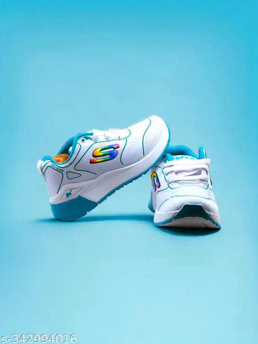 Trendy kids' athletic shoes, blue, white, red, and teal accents, lace-up closure