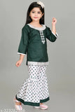 Cotton girls kurta set with A-line palazzo and sharara bottoms, embellished three-quarter sleeves - Indian fashion for every occasion