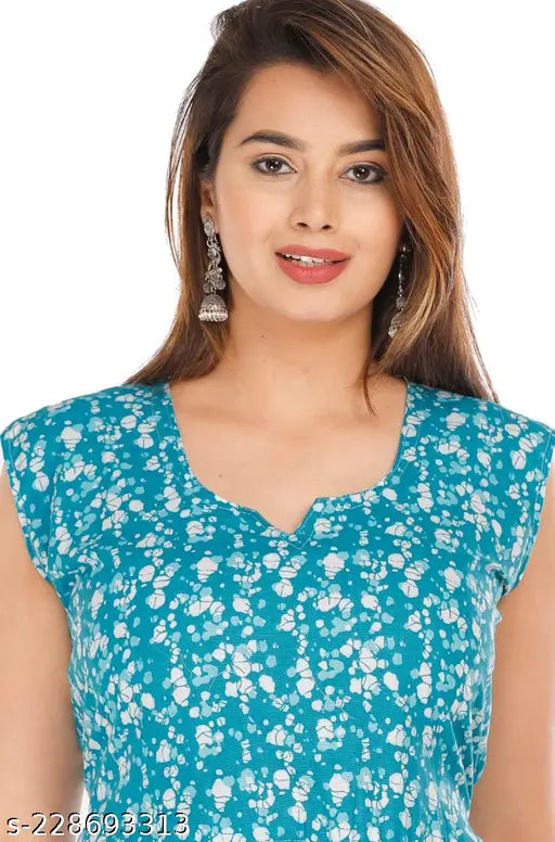 Women's printed cotton Anarkali summer dress, full-length, sleeveless. Vibrant design in a comfortable cotton blend. Perfect for beach and everyday wear. Made in India