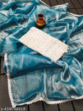 Blue georgette saree with lace detailing, displayed on a surface