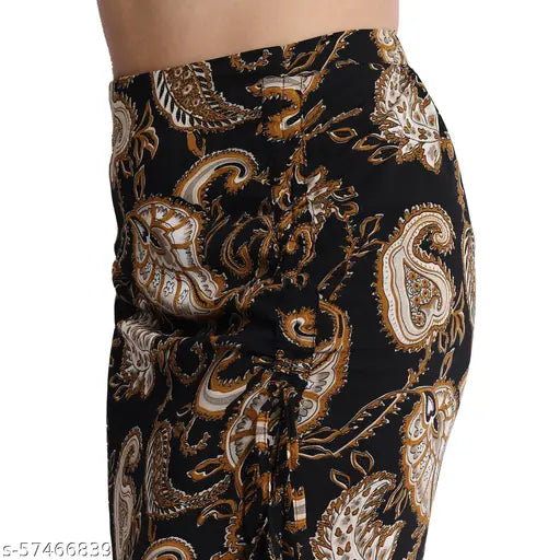 Black crepe, printed net one-side ruched skirt with slit and zip, size 28 (waist 26in, length 34in), India-made fashion item on model