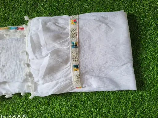 White crepe knee-length kurti with intricate embroidery, ideal for festive occasions