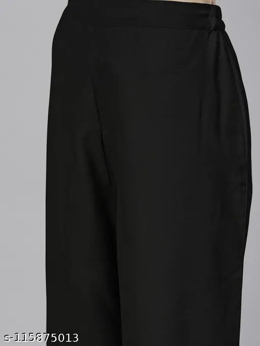 Women's black cotton blend kurti set with dupatta and bottomwear. Solid design, three-quarter sleeves, size options available