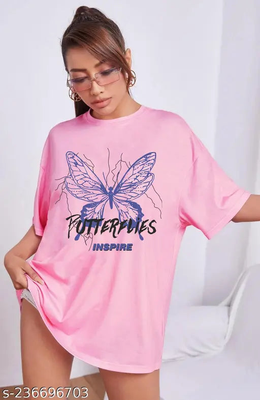 Pink oversized t-shirt with white and black butterfly graphic