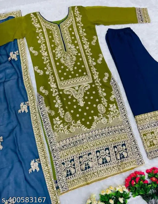 Green and gold traditional women's kurta sets with embroidered detailing, long sleeve with intricate work