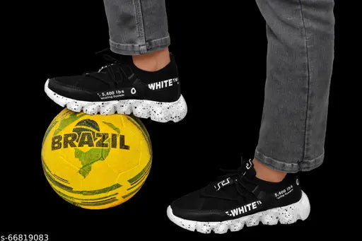 Black and white sneakers with white sole