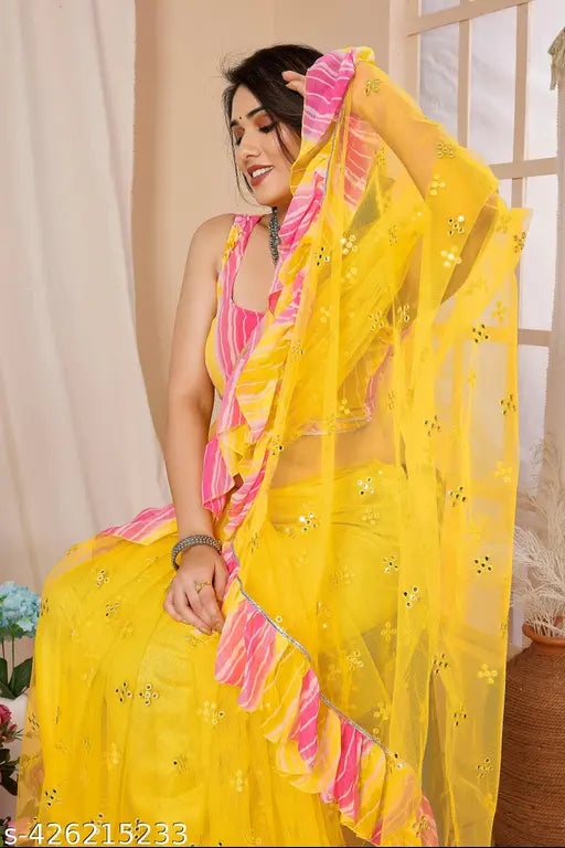 Women's yellow mirror work saree from Dhruti Creations, nitiyellow