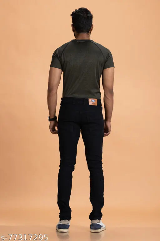 Solid black denim jeans for men, durable and stretchable with comfortable pockets. Perfect for casual, party, or office wear. Available in sizes 28-42 (waist 28-42, length 42, hip 28-42). India origin