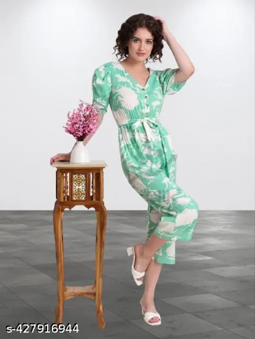 Trendy Pista printed cotton blend women's long puff sleeve v-neck button jumpsuit, modern design, India origin" (106 characters)