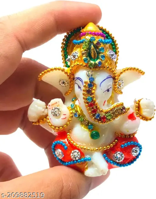 Marble Ganesha idol, handcrafted for home & office decor, 2"x2"x2". Elegant showpiece for spiritual awakening, ideal for altars & meditation spaces