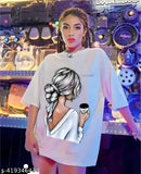 Woman wearing a white graphic t-shirt with an illustration of a woman holding a coffee cup