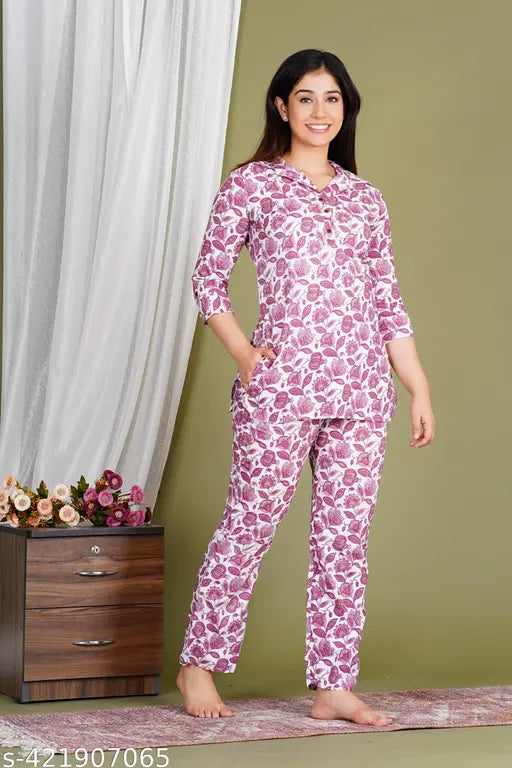 Cotton printed 60*60 night suit/coords set, featuring a collar neck kurta pajamas set with three-quarter sleeves. Ultra-luxe satin material for a dramatic look. Made in India