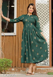 A woman in a green rayon printed anarkali kurta with short sleeves and a round neckline