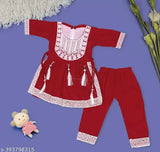 Beautiful yellow rayon kurti set for girls party wear, A-line top and pyjama bottoms, embroidered with vibrant colors. Rayon fabric for easy movement and breathability, perfect for kids' playtime. Made in India